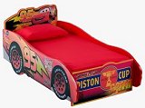 Cars Wood Toddler Bed from Delta will have your child looking forward to bedtime. It is shaped like a race car and sporting the number 95 made famous by the Disney movie, a child will be immersed in the Cars universe and dream of racing their bed to win the "Piston Cup". Made of solid wood construction, the Toddler Bed uses a standard crib mattress. decorating kids cars bedroom furniture