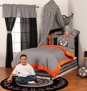 eyo's Tires Bedding Collection splashes a surge of energy through your young man's room! Decorated in his favorite tire theme, featuring colors of black, white, and a bold orange, the set is striking indeed. Select the bedding size that suits your needs and choose from our many coordinating accessories for the complete Teyo's Tires Bedroom! 